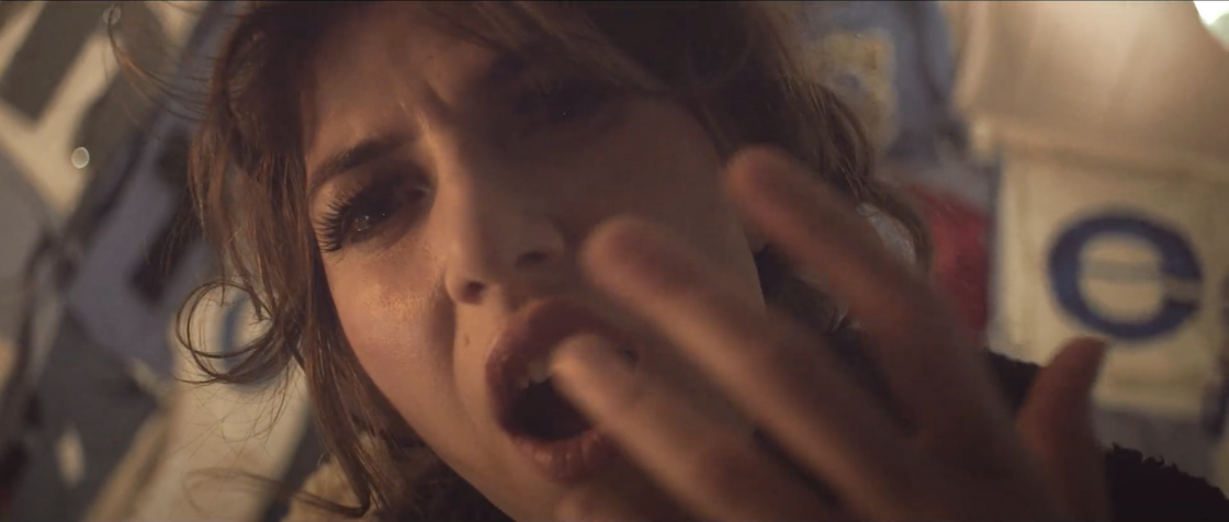 A screenshot from Aldous Harding's music video for "Fever"